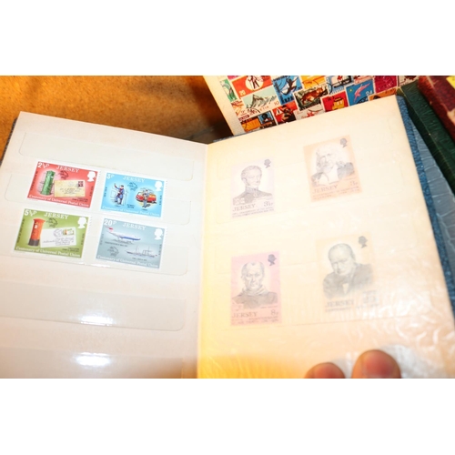 496 - 7 BRITISH ISLES STAMP COLLECTING BOOKS & STAMPS