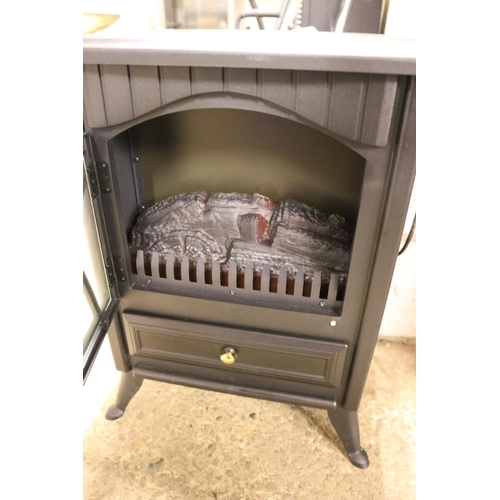 125 - ELECTRIC LOG EFFECT HEATER - WARRANTED UNTIL 12 NOON TUESDAY FOLLOWING THE ABOVE SALE