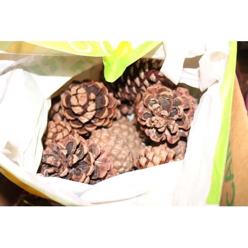 265 - BOX OF XMAS DECORATIONS & BAG OF PINE CONES