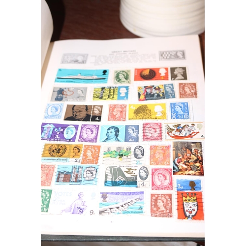 410 - THE UNIVERSAL STAMP ALBUM WITH STAMPS