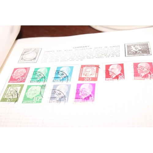 410 - THE UNIVERSAL STAMP ALBUM WITH STAMPS