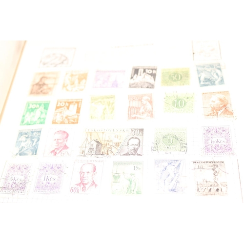 410 - THE UNIVERSAL STAMP ALBUM WITH STAMPS