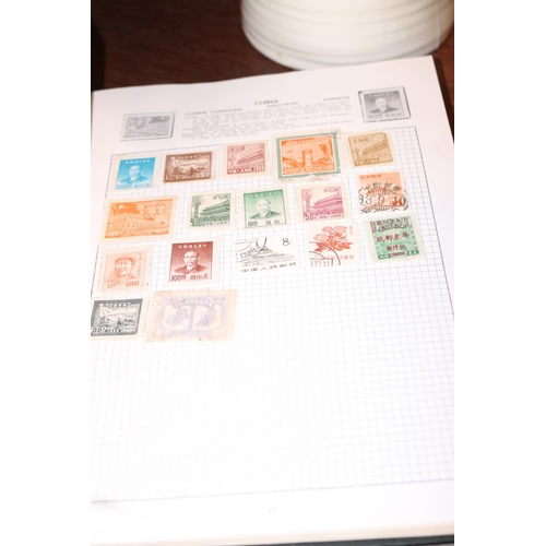 410 - THE UNIVERSAL STAMP ALBUM WITH STAMPS