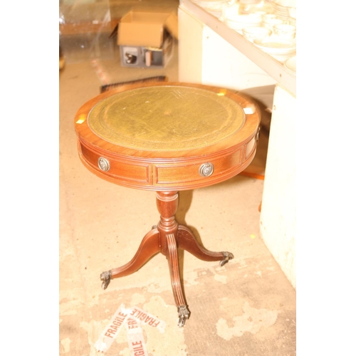 575 - MAHOGANY SMALL DRUM TABLE - LEATHER TOP ABOVE DRAWERS