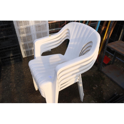 18 - 4 PLASTIC GARDEN CHAIRS WITH SEAT PADS