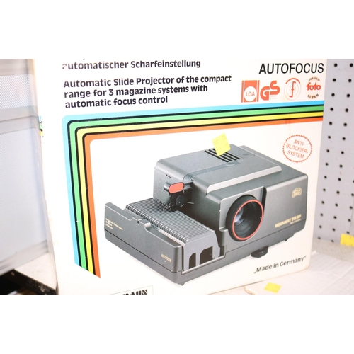 141 - NOVAMAT 315 AF PROJECTOR & SLIDE PROJECTOR - WARRANTED UNTIL 12 NOON TUESDAY FOLLOWING THE ABOVE SAL... 