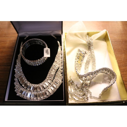 369 - 2 BOX SETS OF NECKLACES & BRACELETS (SILVER STYLE)