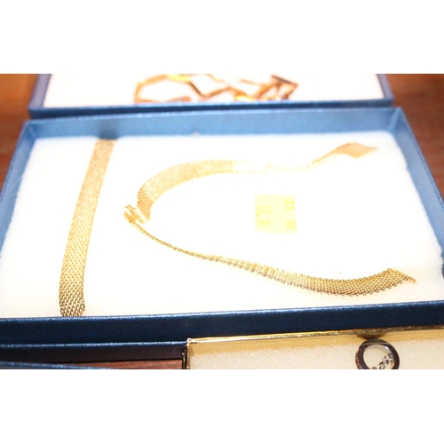 396 - 4 GOLD & SILVER BOXED NECKLACES/BRACELET SETS