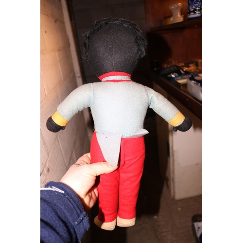 407 - A BLACK FELT DOLL