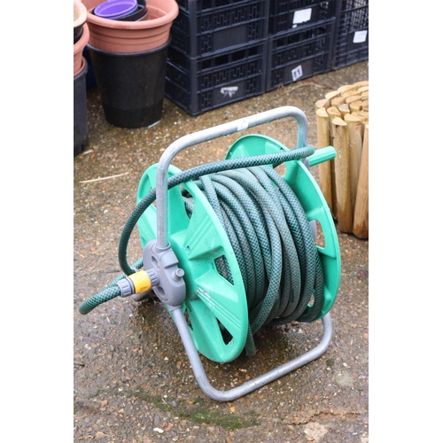 44 - GARDEN HOSE & REEL