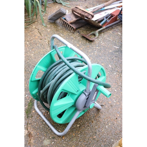 44 - GARDEN HOSE & REEL