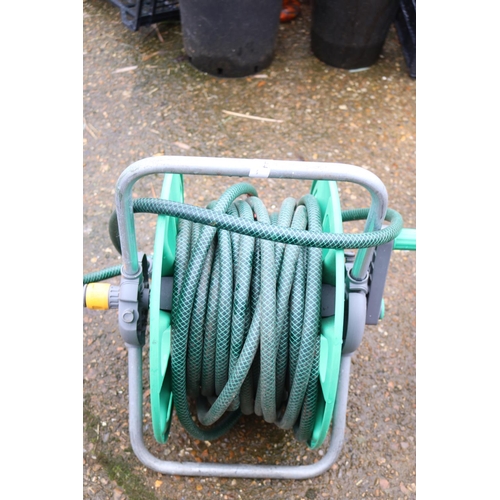 44 - GARDEN HOSE & REEL