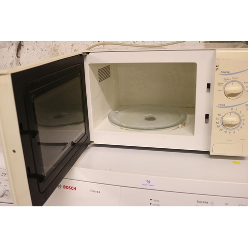 76 - MICROWAVE - WARRANTED UNTIL 12 NOON FOLLOWING THE ABOVE SALE