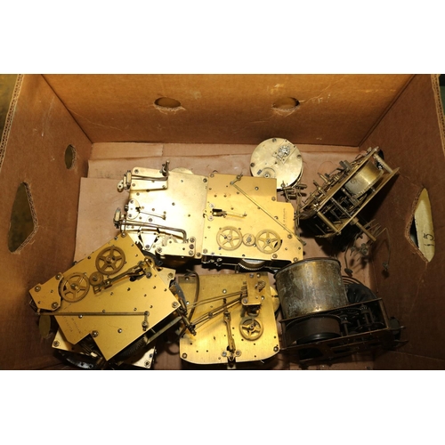 222 - 4 BOXES OF ANTIQUE CLOCK PARTS