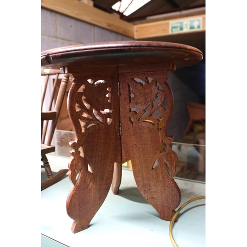 369 - SMALL ORNATELY CARVED TABLE WITH INLAID SHELKF