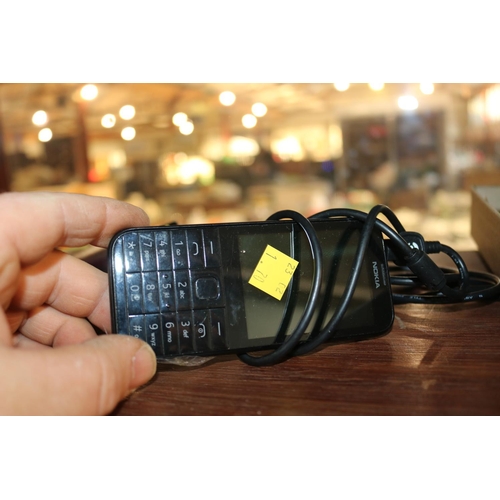 391 - 2 MOBILE PHONES (1 NOKIA, 1 DORO) - ONLY 1 CHARGER - WARRANTED UNTIL 12 NOON TUESDAY FOLLOWING THE A... 