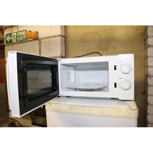 74 - ALTIMO MICROWAVE WARRANTED UNTIL 12 NOON TUESDAY FOLLOWING THE ABOVE SALE