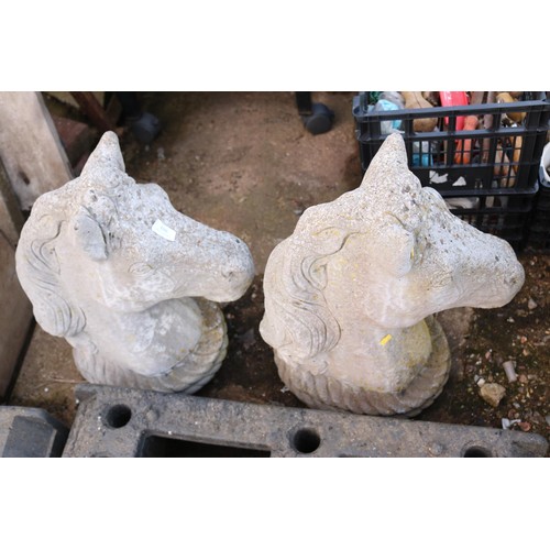 106 - 2 X HORSE HEAD GARDEN ORNAMENTS