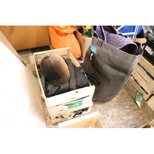 107 - 2 boxes of linen and bag of various horse equestrian equipment inc , bridal and whips etc