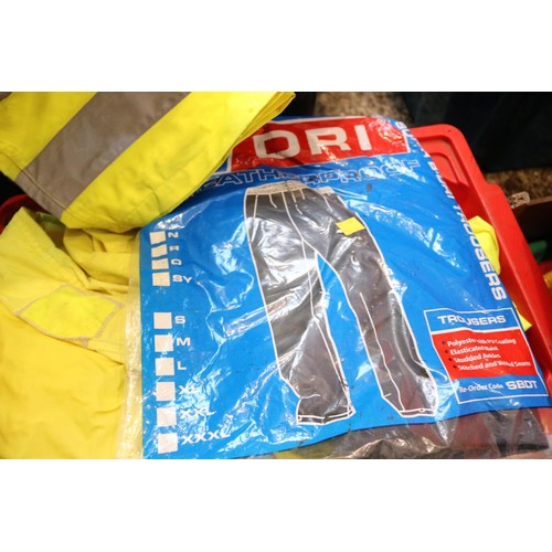 134 - Two boxes of various high, viz coat, waterproof, trousers, etc