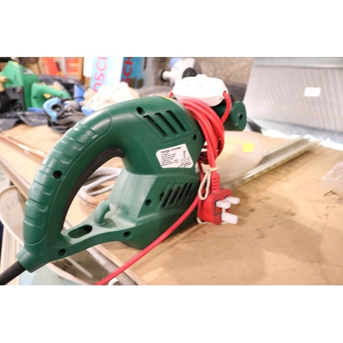 200 - Electric hedge trimmer - warranted until 12 noon Tuesday following the above sale