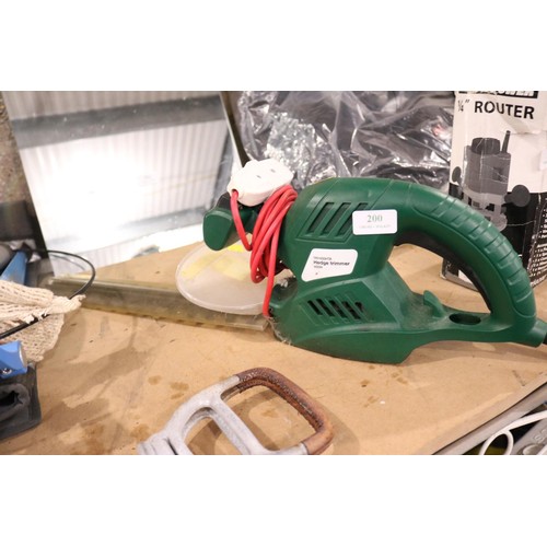 200 - Electric hedge trimmer - warranted until 12 noon Tuesday following the above sale