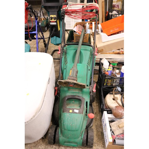 228 - Electric lawnmower and black and decker strimmer - warranted until 12 noon, Tuesday, following the a... 