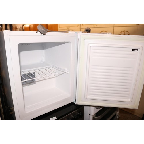 251 - Essentials table top freezer-warranted until 12 noon, Tuesday, following the above sale