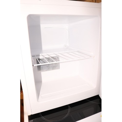 252 - Essentials table top freezer-warranted until 12 noon, Tuesday, following the above sale