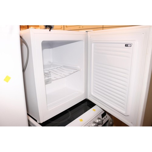 252 - Essentials table top freezer-warranted until 12 noon, Tuesday, following the above sale