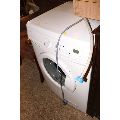 255 - John Lewis, J L,WM1407 washing machine - warranted until 12 noon, Tuesday, following the above sale