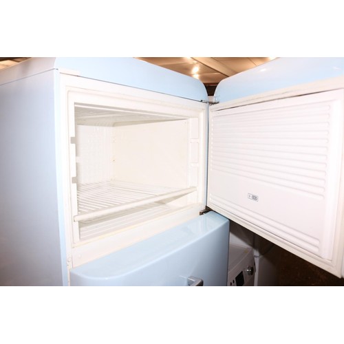 263 - Smeg light blue fridge/freezer - warranted until 12 noon Tuesday following the above sale