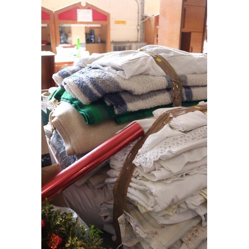 374 - 2 bundles of of bed linen, blankets, duvets, pillows, etc