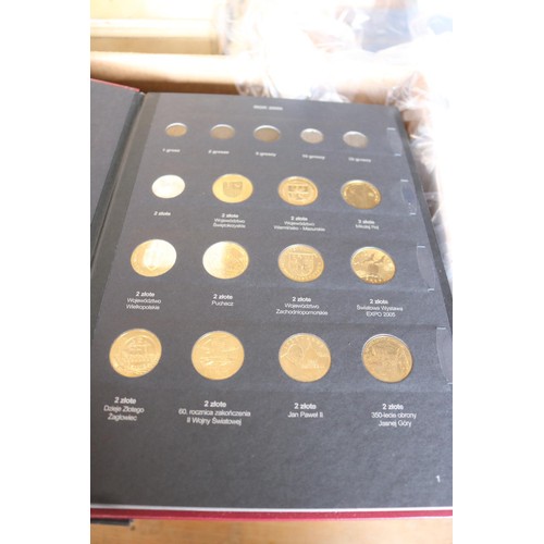 442 - 9 Polish coins albums (part full with Polish coins)