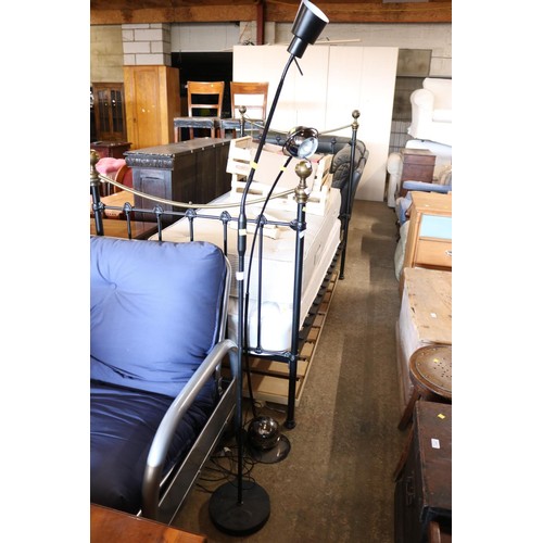 643 - 2 floor lamps (1 chrome, 1 black) - warranted until 12 noon Tuesday following the above sale