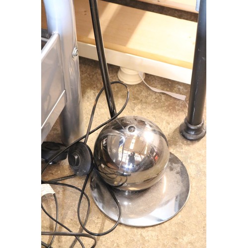 643 - 2 floor lamps (1 chrome, 1 black) - warranted until 12 noon Tuesday following the above sale