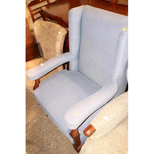 648 - Reupholstered antique armchair