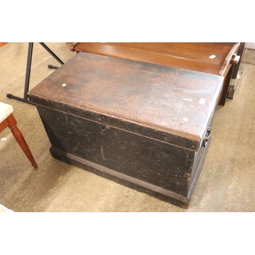 653 - Large wooden chest, brass lock