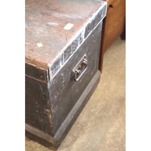 653 - Large wooden chest, brass lock