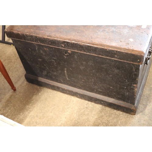 653 - Large wooden chest, brass lock