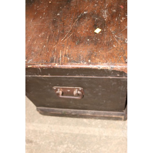 653 - Large wooden chest, brass lock