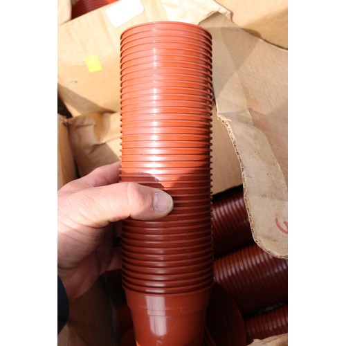 77 - 2 x boxes of plastic pots