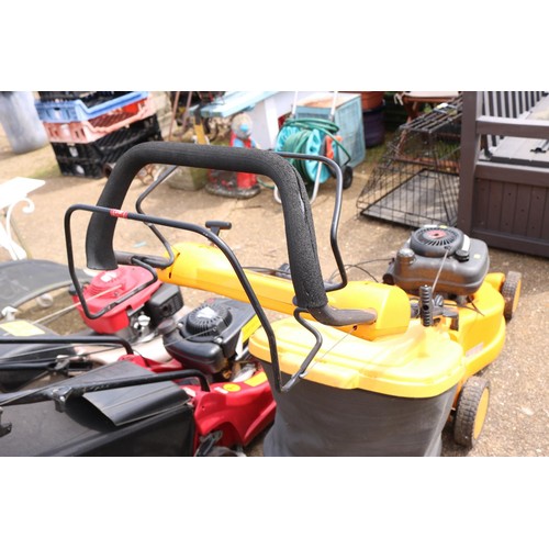 84 - Yellow self propelled lawn mower