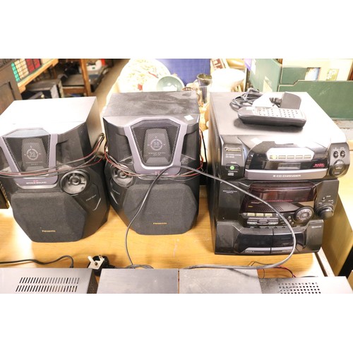 115 - Panasonic music system with two speakers in remote control-warranted until 12 noon Tuesday following... 