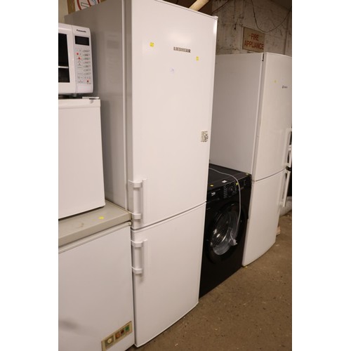 138 - Liebherr fridge/freezer - warranted until 12 noon Tuesday following the above sale