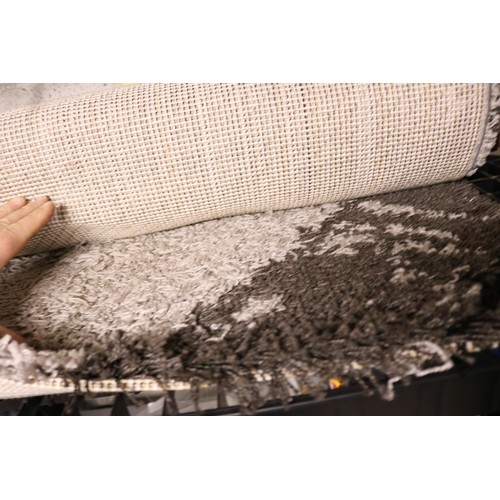 153 - Large black & white rug