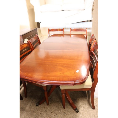 659 - Reupholstered extending dining table with 6 chairs