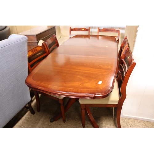 659 - Reupholstered extending dining table with 6 chairs