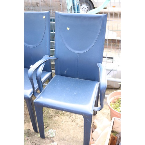 34 - 2 leather outside chairs