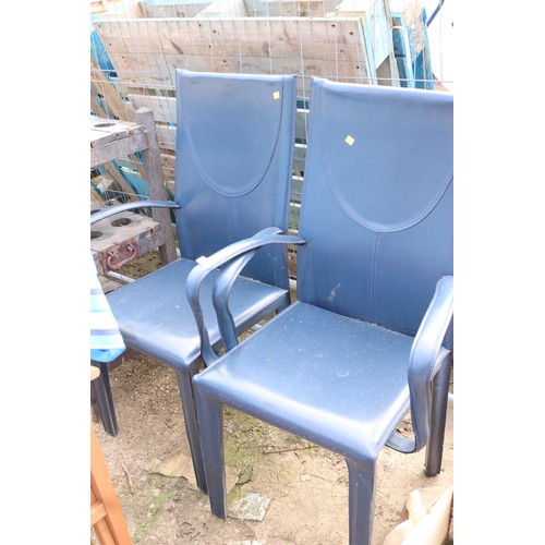 34 - 2 leather outside chairs